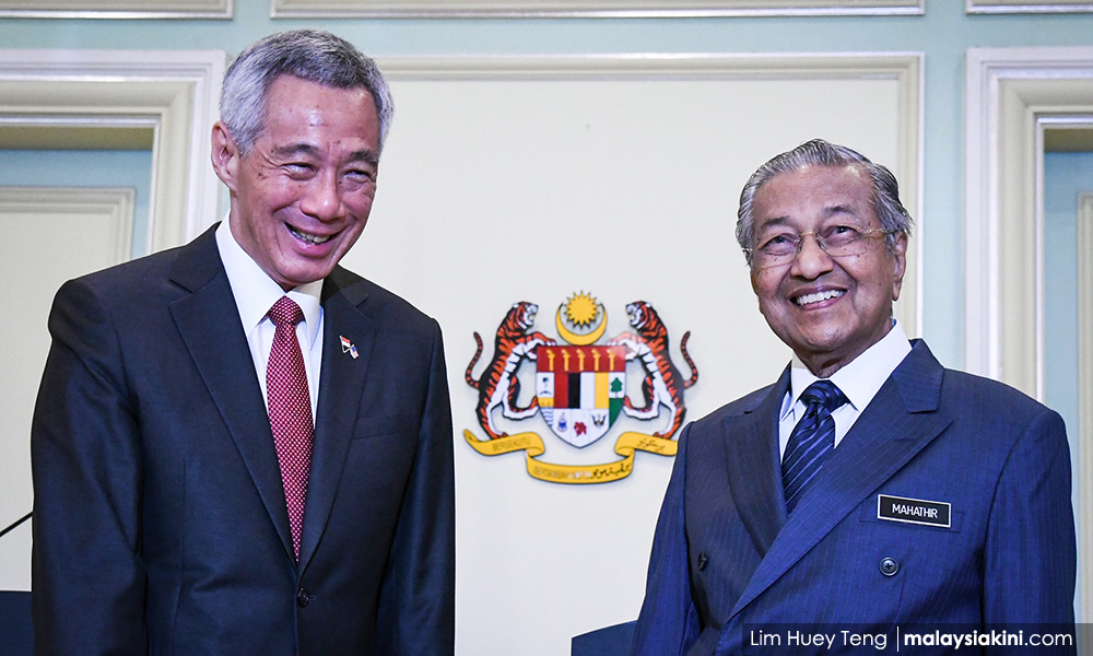 Mahathir hopes for change in water deal after Singapore GE