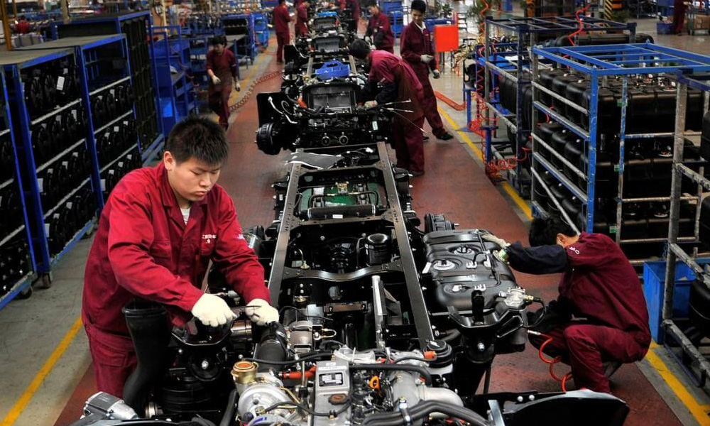 Asia's factory pain eases as region emerges from pandemic