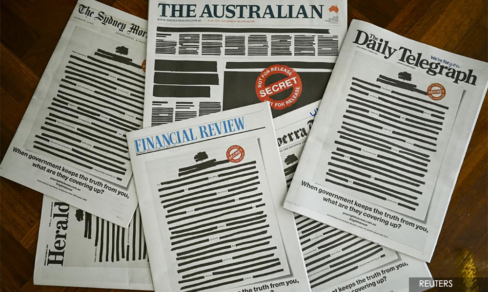 Australian newspapers redact front pages to protest media curbs