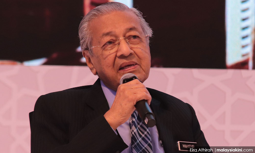 Mahathir urges Malaysians to practice social distancing