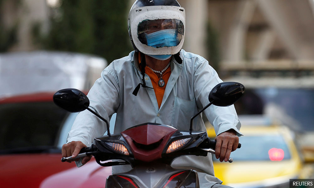 Thai woman downs rat poison to protest slow aid rollout