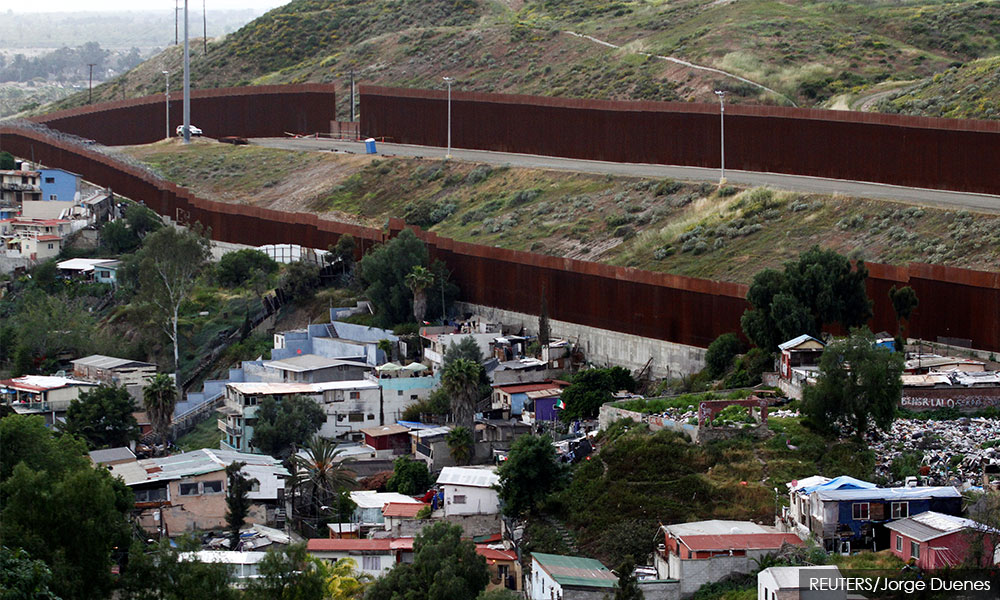 Mexicans wonder if Trump's wall could stop coronavirus spreading south