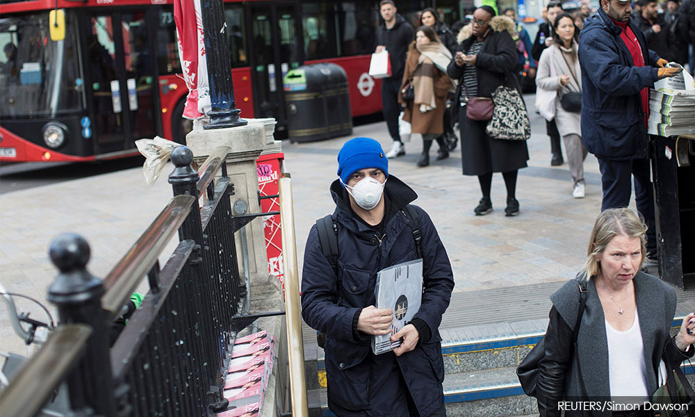 UK to ban mass gatherings from next week to curb coronavirus