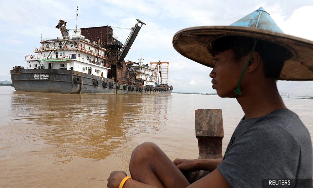 As Myanmar farmers lose their land, sand mining for Singapore is blamed