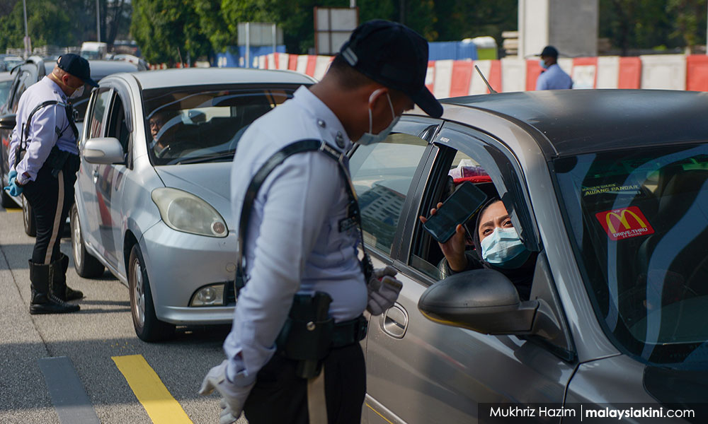 Polis batal saman tak pakai pelitup separuh muka dalam kereta sendiri