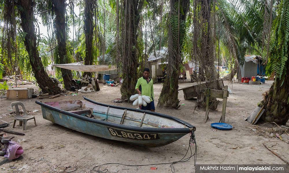 With boats at shore, Pulau Indah Orang Asli fisherfolk rely on handouts to survive