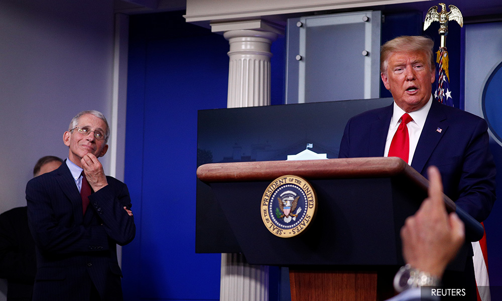 Do social distancing better, White House doctor tells Americans. Trump objects