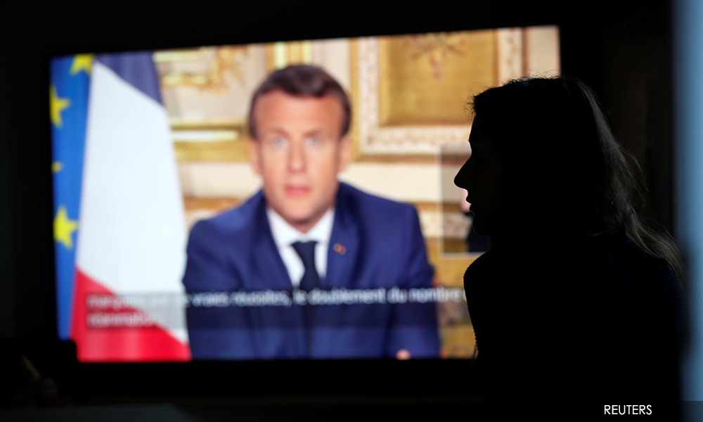 Macron extends France's lockdown for another month