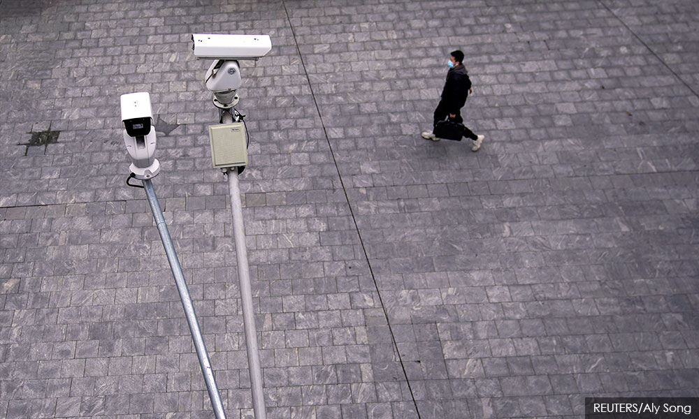 S'pore spy case reawakens fears China recruiting on island state