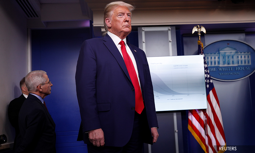 Trump warns Americans of a tough two weeks ahead in coronavirus fight