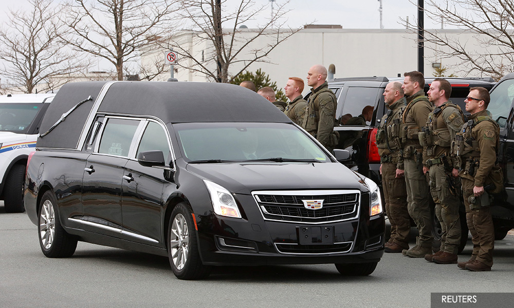 Police hunt for motive as Canada's worst mass shooting death toll rises to 23