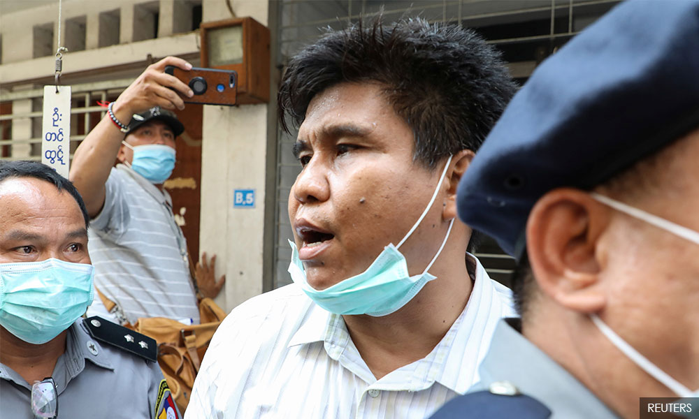 Myanmar charges journalist under terrorism law, blocks news websites