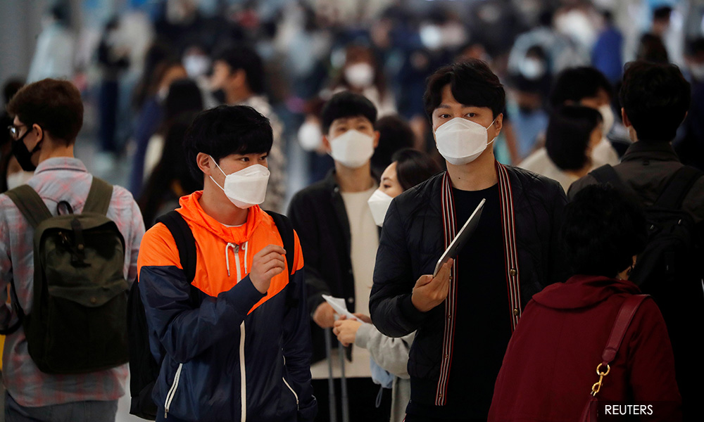 Wear masks in public says WHO, in update of Covid-19 advice