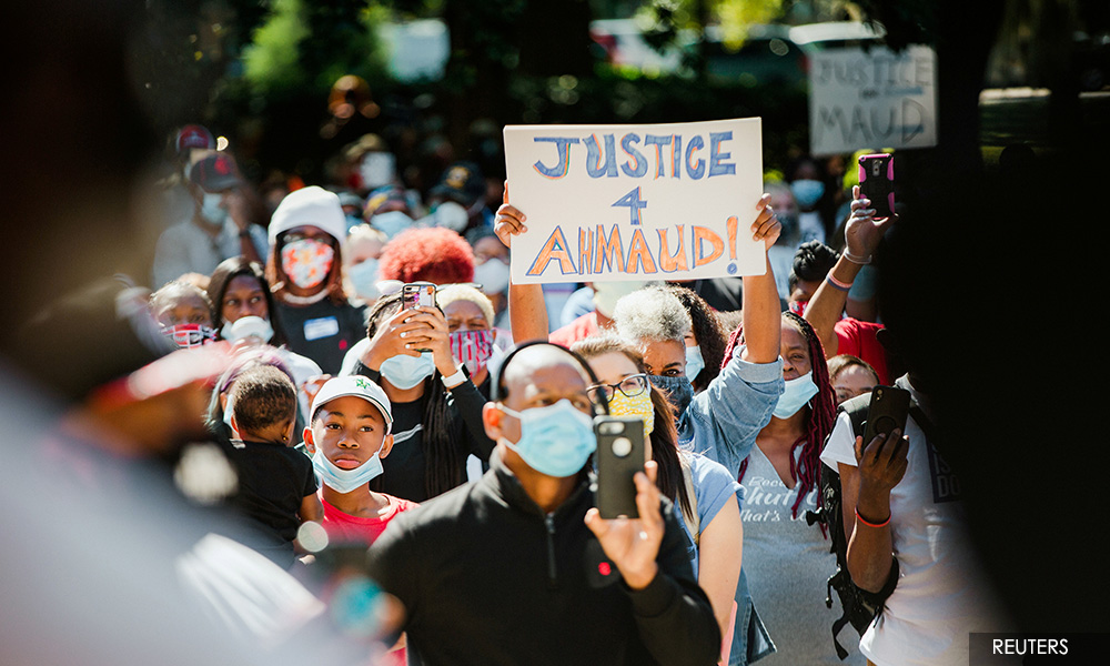 Georgia rally for slain black jogger calls for removing district attorneys