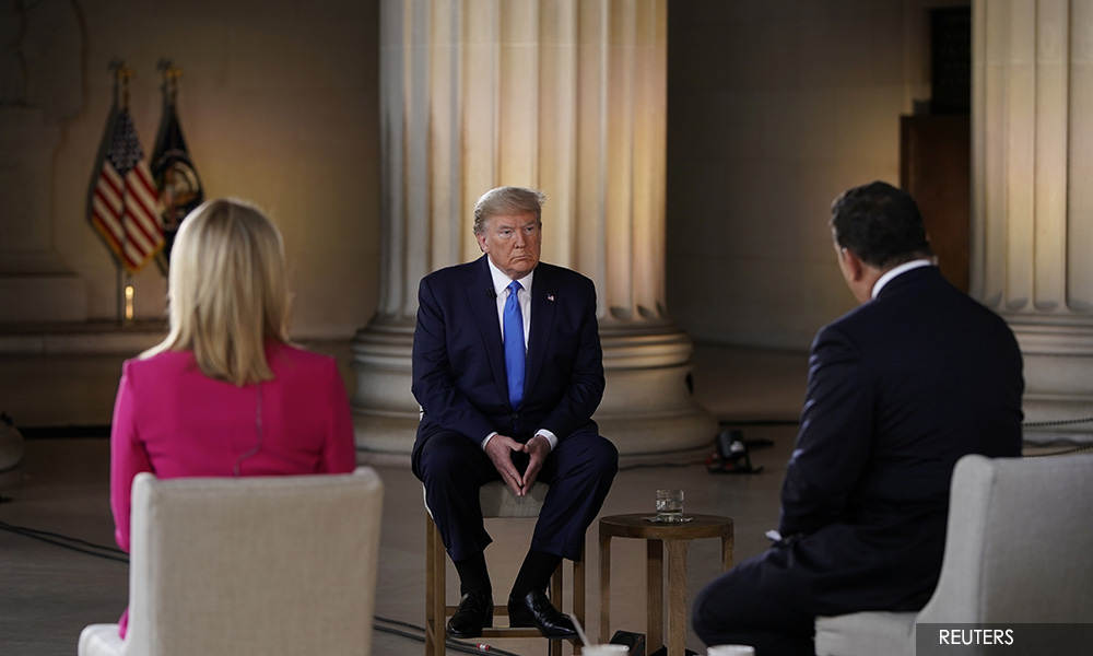 Trump says up to 100,000 Americans may die from coronavirus