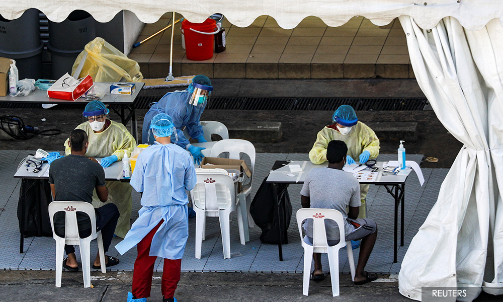 Singapore reports 675 new Covid-19 cases