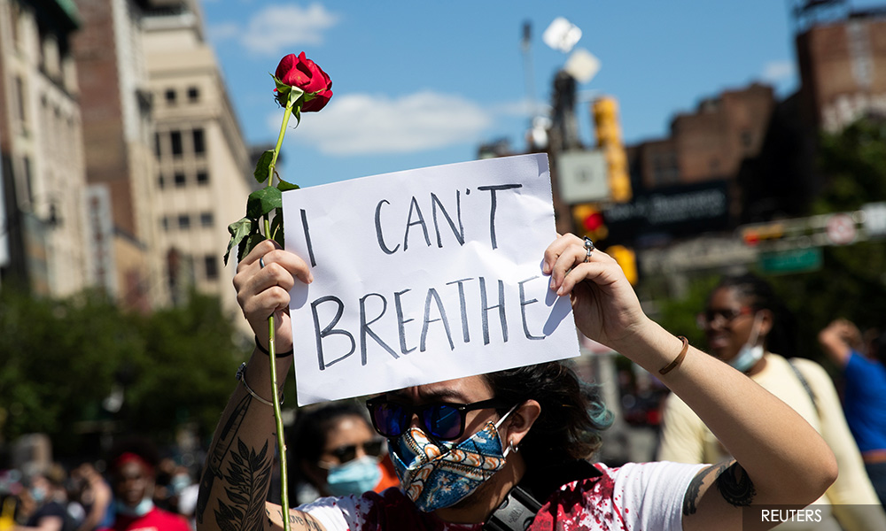 'I can't breathe' protests heat up as curfews imposed in several US cities