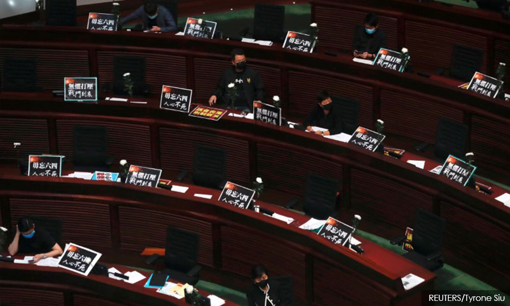 Hong Kong passes China national anthem bill amid protests by democracy lawmakers