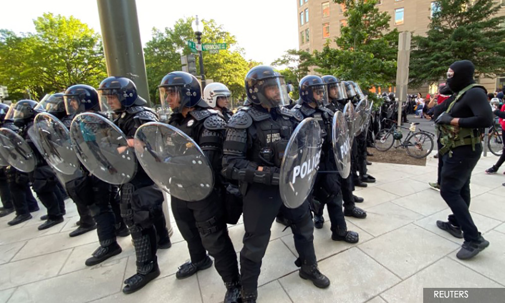 On the streets of Washington, pleas for change met with batons and rubber bullets