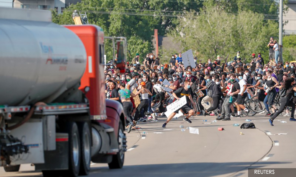 Minnesota trucker who drove through protesters was 'frustrated'