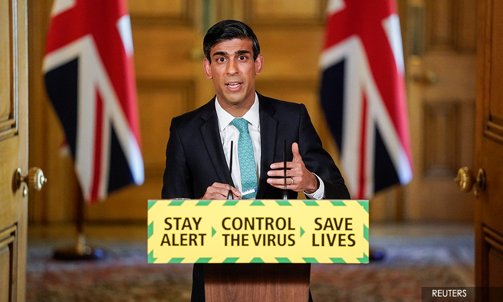 Britain to urgently review two-metre social distancing rule