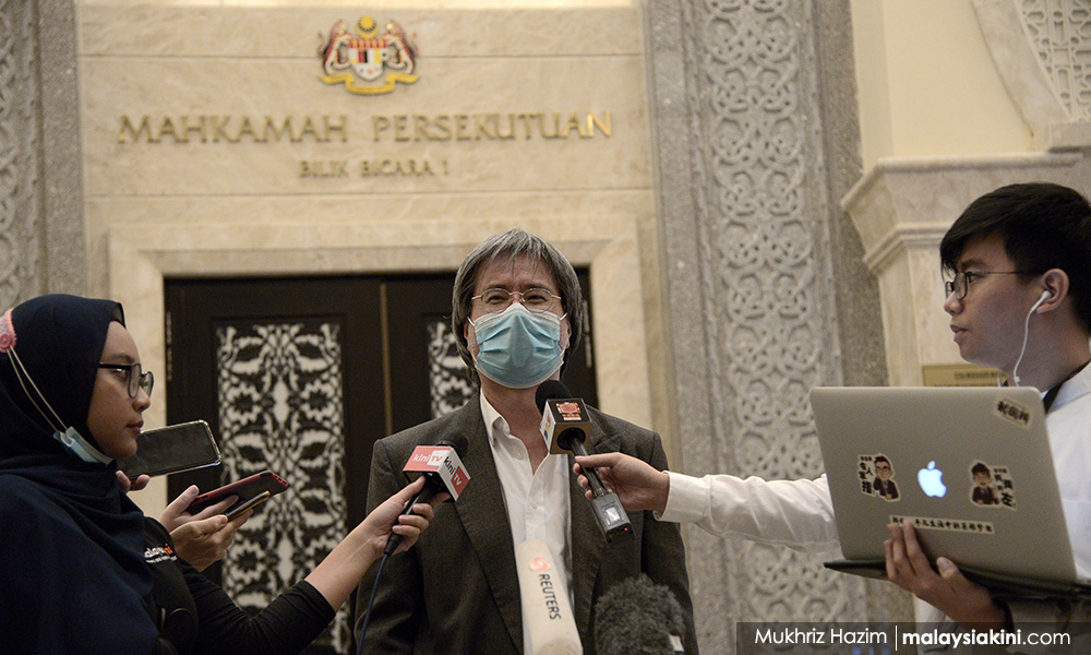 Mahkamah tangguh keputusan kes hina mahkamah terhadap Mkini