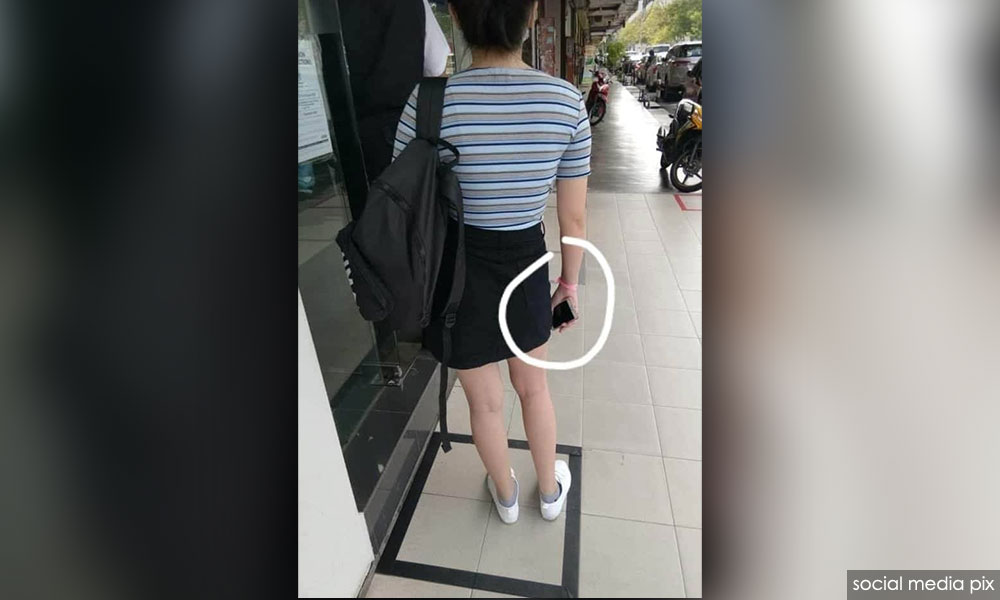 Police to track down woman with pink bracelet at bank
