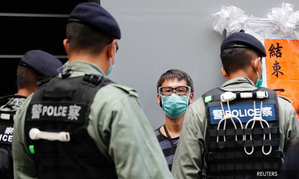 Hong Kong marks handover anniversary as national security law takes effect