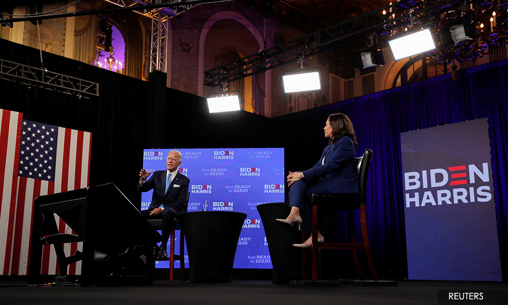 Kamala Harris rebukes Trump in historic campaign-trail debut with Biden