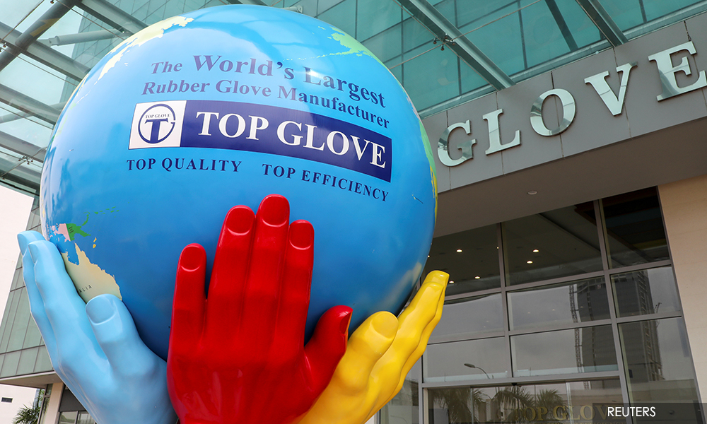 Racing to reverse US ban, Top Glove improves workers' housing