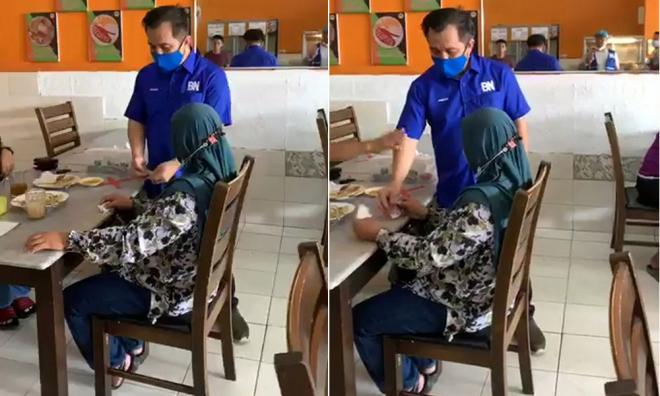 Umno man: I was handing out pamphlets, not money