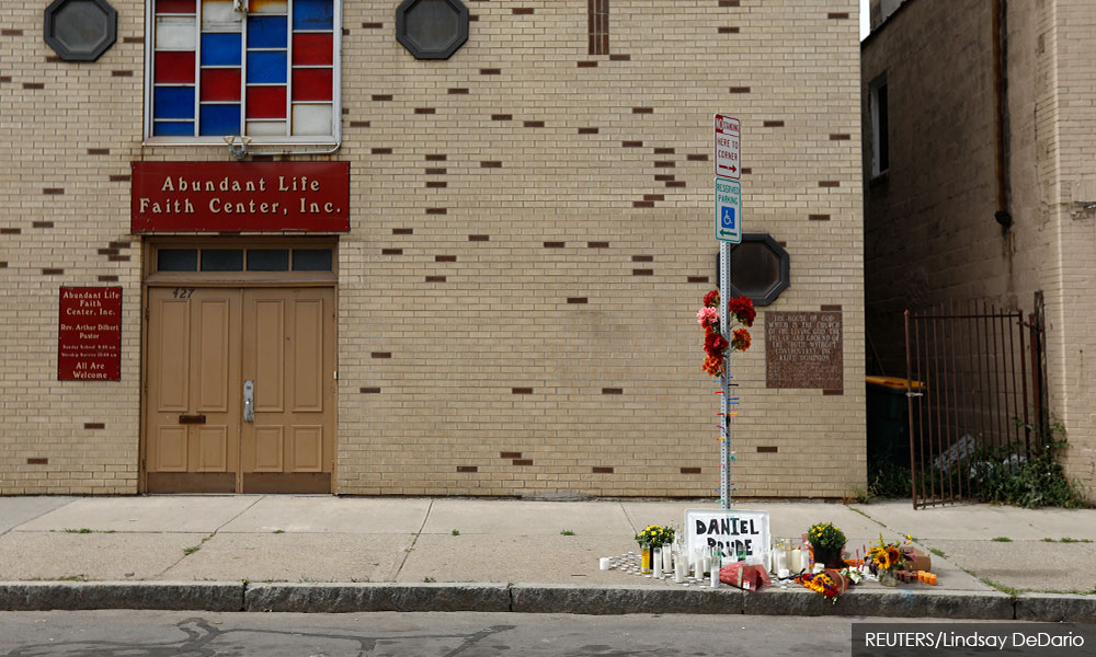 Seven police officers in Rochester suspended over black man's death
