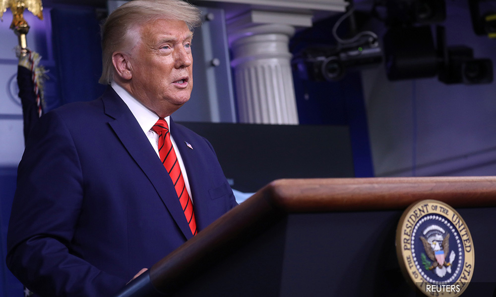 Trump on defensive as critics seize on reports he insulted US veterans