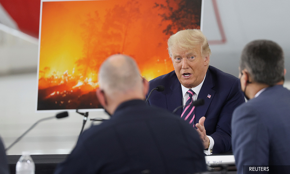 Trump and Biden clash over US wildfires as blazes become an election issue