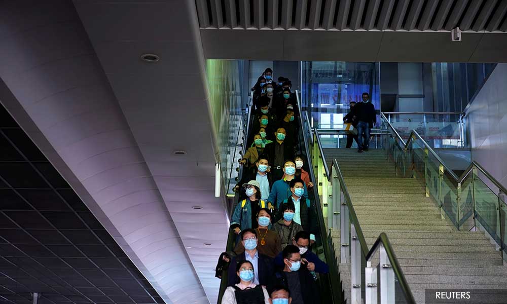 China reports surge in symptomless Covid-19 infections