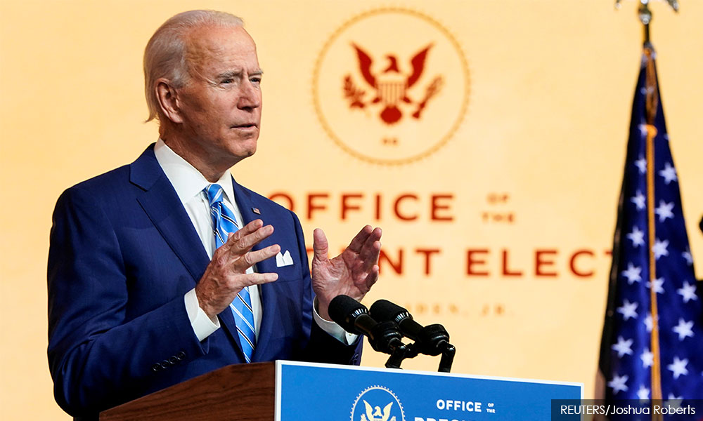 Biden promises help to US workers hit by pandemic, Trump hints at 2024 run