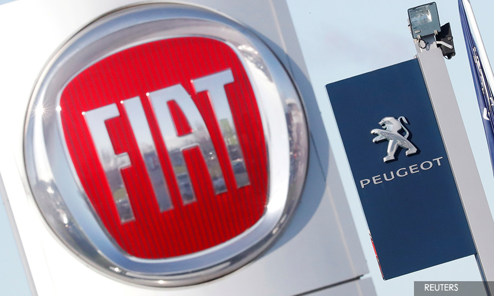 Top Peugeot shareholders approve merger with Fiat