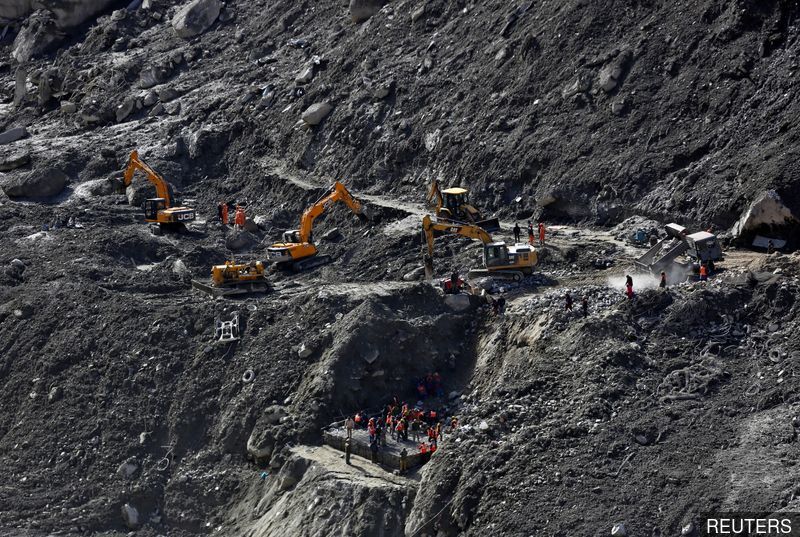 Hopes fade as rescuers struggle to find 35 men trapped in Indian Himalayas tunnel