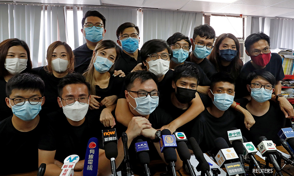 Dozens of leading Hong Kong democrats brace for national security charges
