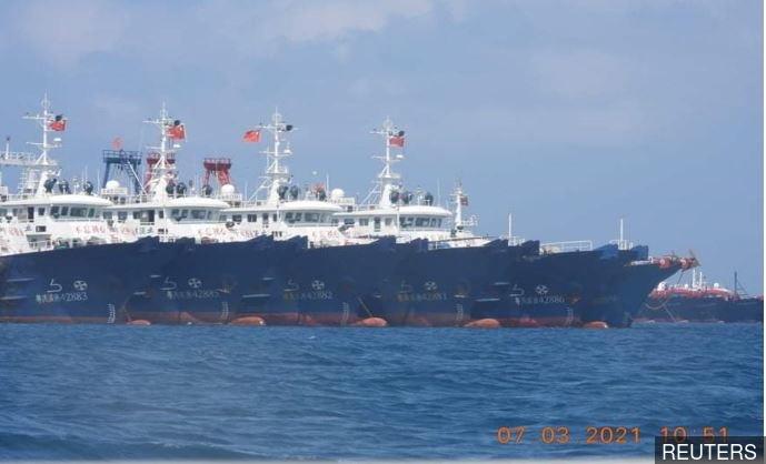 Philippines protests 'threatening presence' of Chinese vessels in disputed waters
