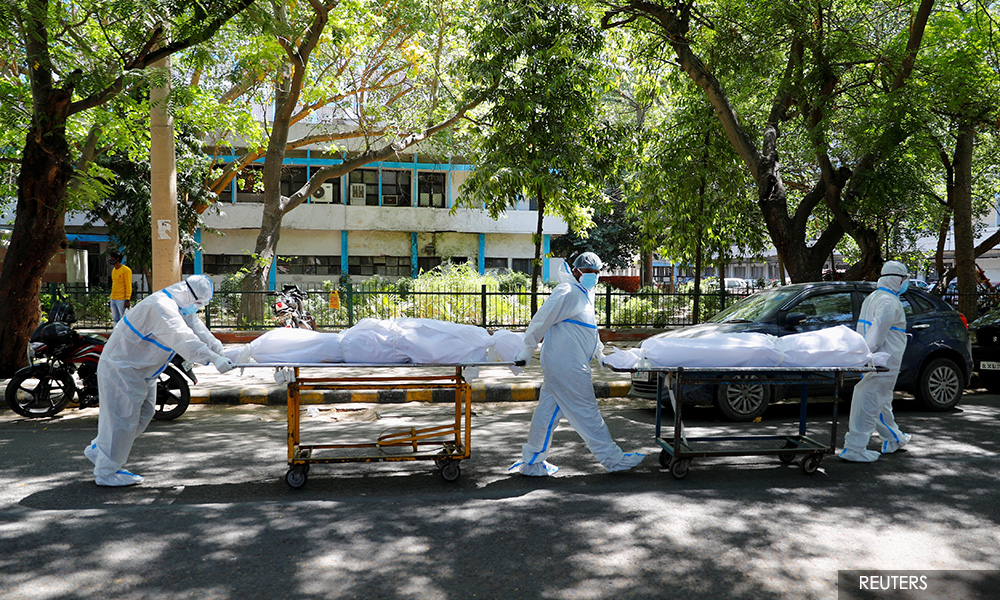 Indian hospitals swamped by Covid-19 as countries promise aid