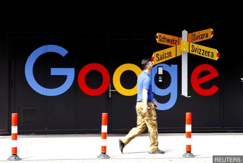 Alphabet sets profit record, plans US$50b share buyback