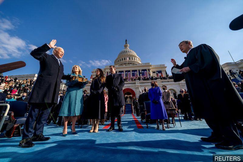 Biden's first 100 days: Covid-19, jobs, foreign policy, immigration, guns and dogs