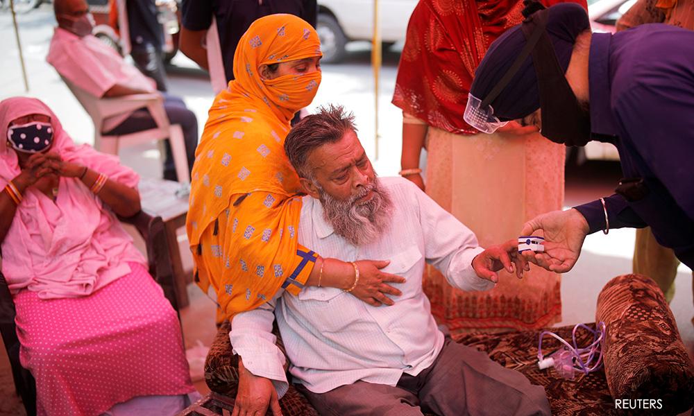 India's Covid-19 cases near 20 million, peak seen nearing