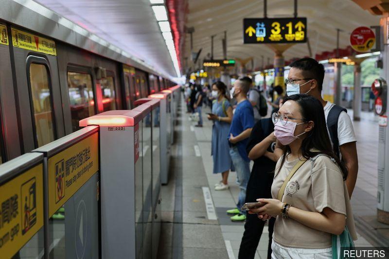 Taiwan may raise Covid-19 alert, shut non-essential shops