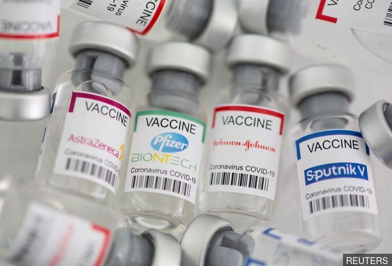 Explainer - Who decides if the world needs Covid-19 booster shots?