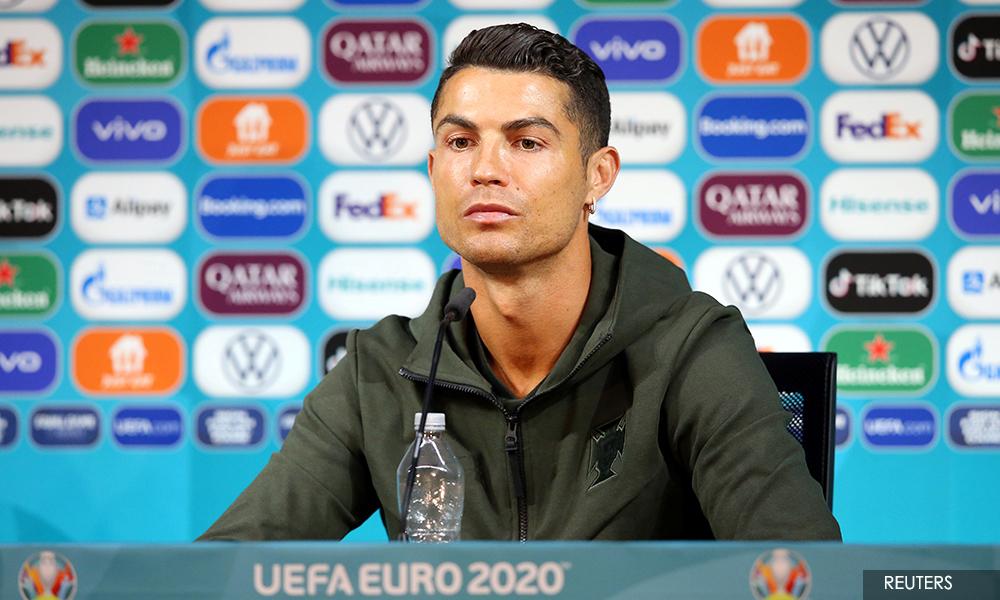 'Drink water!' - Ronaldo removes Coca-Cola bottles at press conference
