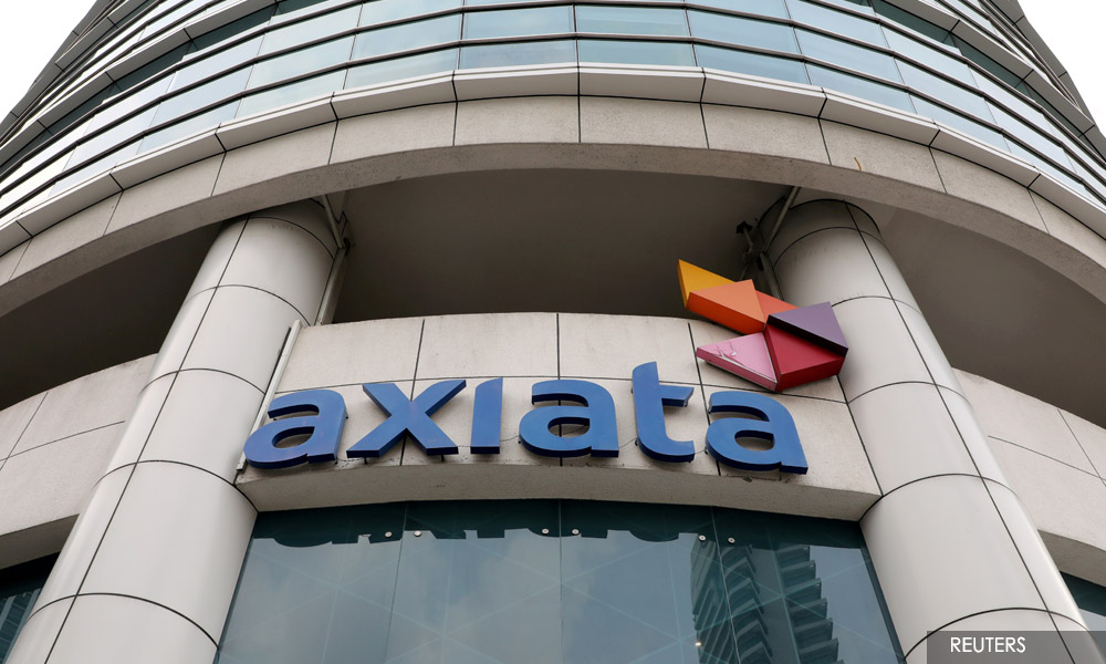 Axiata, Telenor sign deal to merge Malaysian telecoms units