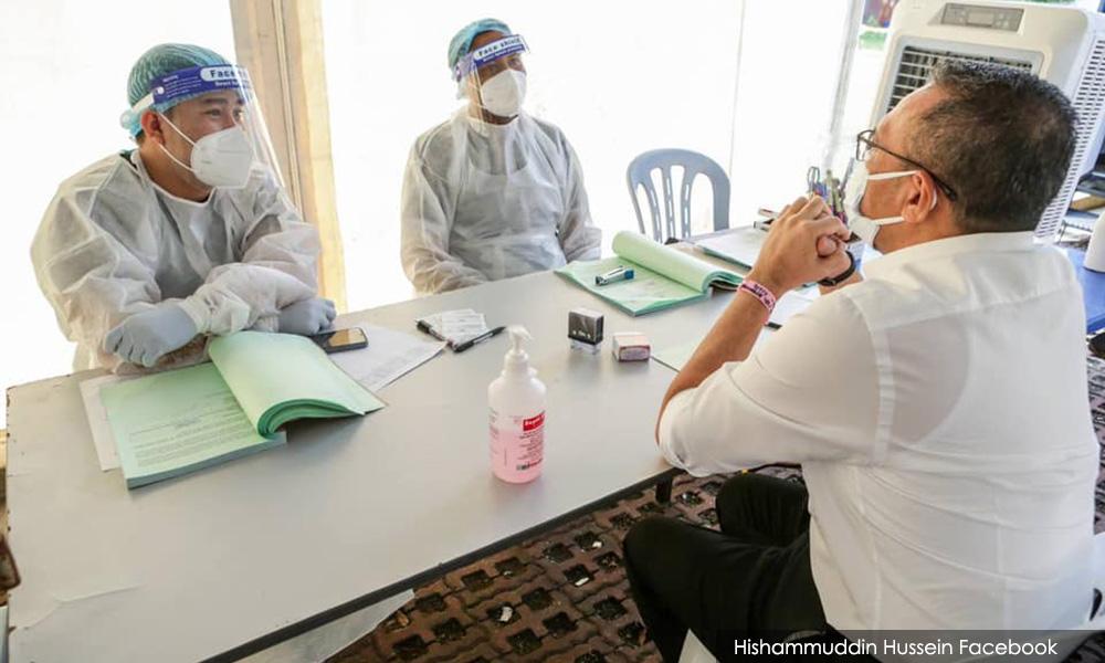 Hisham quarantined after close contact ahead of meeting with 'big brother' Wang