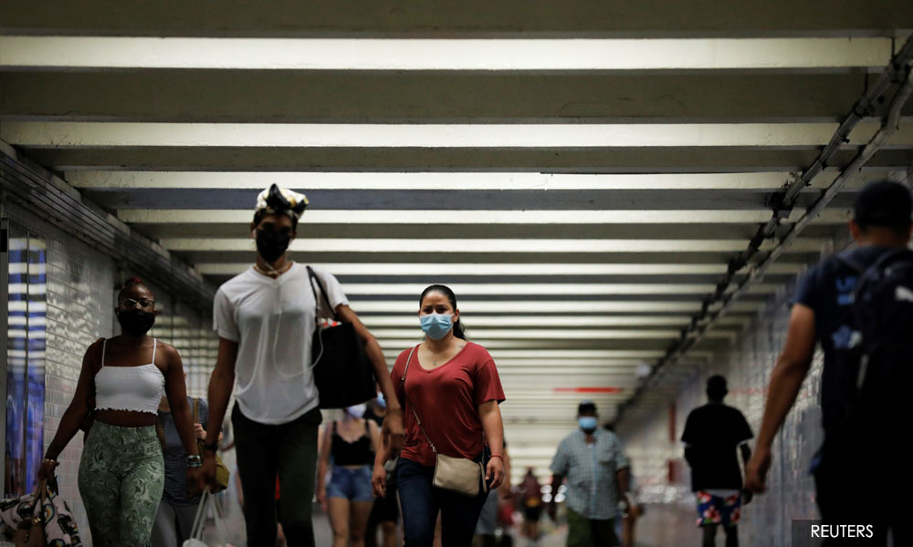 US urges vaccinated Americans to wear masks indoors in many places